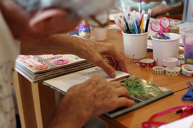 resident doing scrapbooking