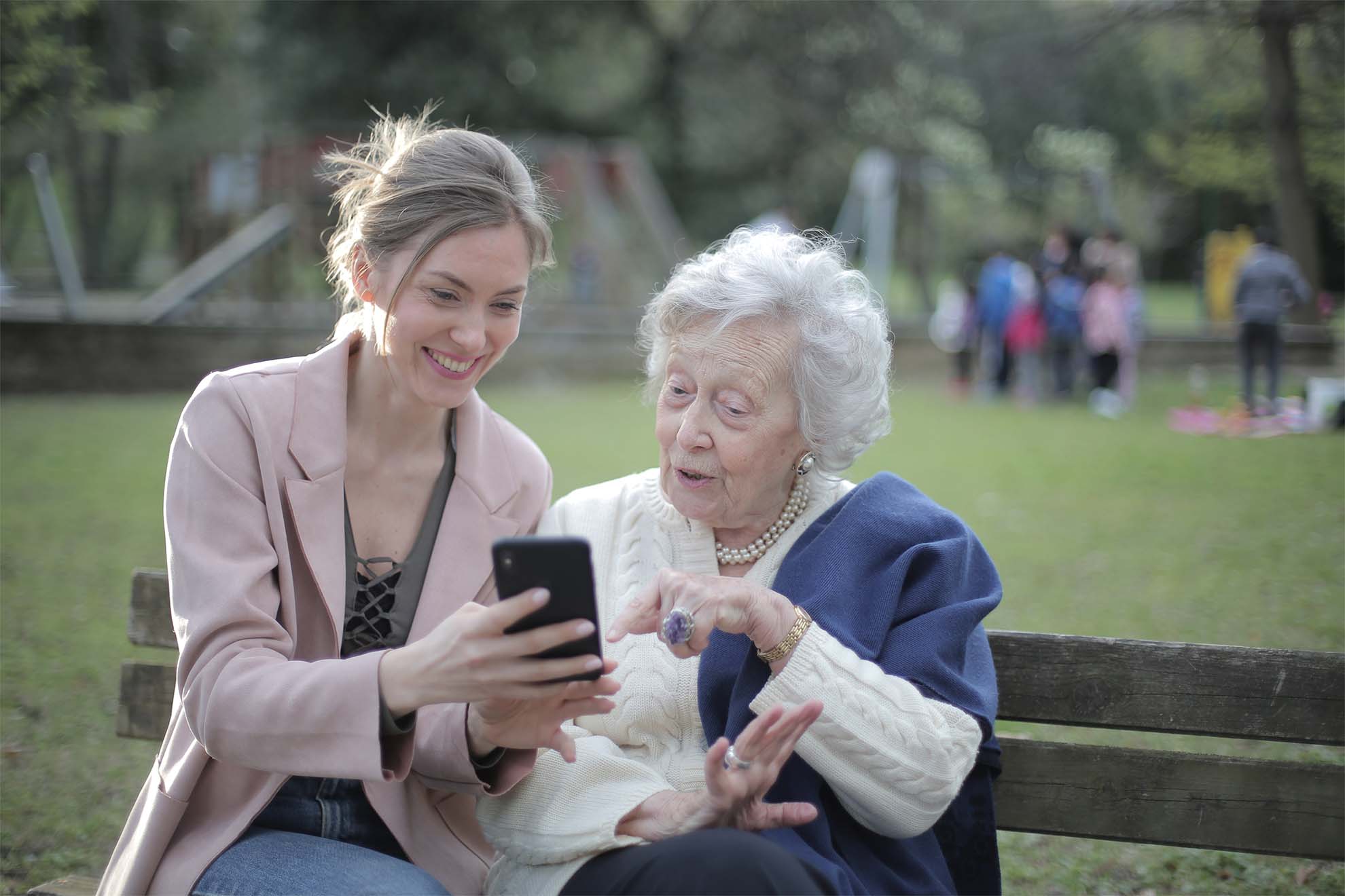resident looking at loved ones phone