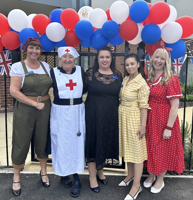our team in 1940s attire for VE day