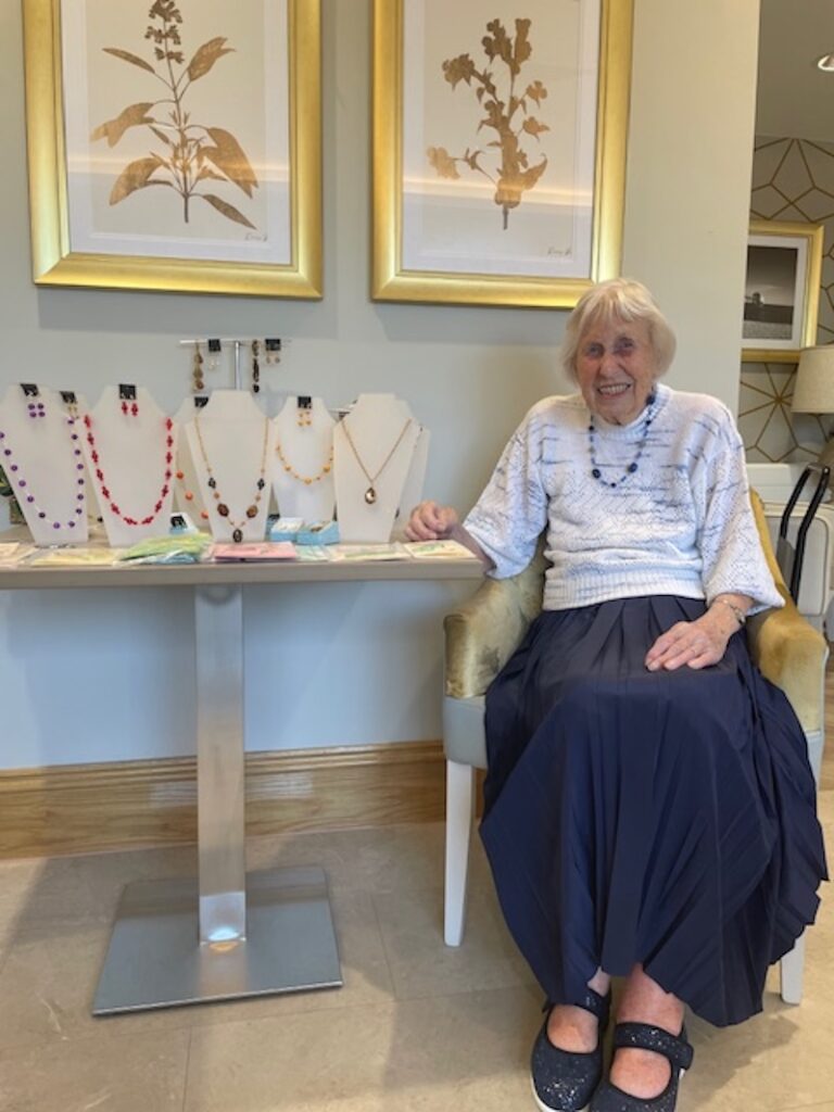 one of our residents mary with her necklaces